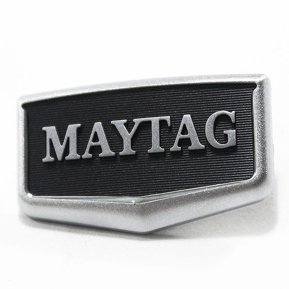 Photo of Part #w10732500, Medallion | 1.75 x 1.00 x 0.90 from Repair Parts Direct